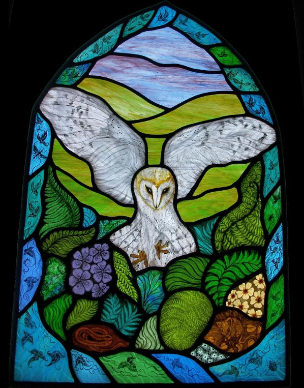 Birds of prey on stained glass
